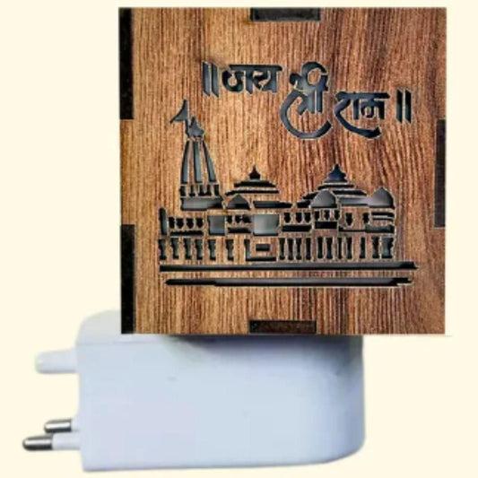 Wooden notebook with engraved design and white pen on a beige background